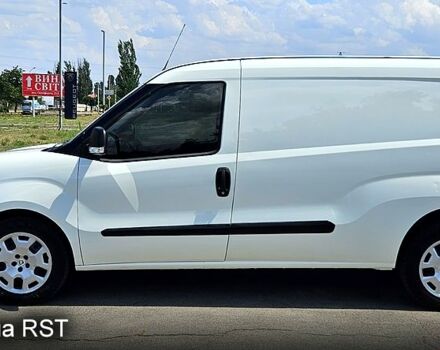 Белый Фиат Добло, объемом двигателя 1.3 л и пробегом 98 тыс. км за 10100 $, фото 2 на Automoto.ua