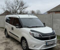 Белый Фиат Добло, объемом двигателя 1.6 л и пробегом 195 тыс. км за 12700 $, фото 1 на Automoto.ua
