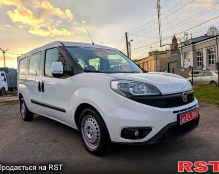 Белый Фиат Добло, объемом двигателя 1.3 л и пробегом 100 тыс. км за 10800 $, фото 1 на Automoto.ua