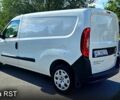 Белый Фиат Добло, объемом двигателя 1.3 л и пробегом 53 тыс. км за 12500 $, фото 2 на Automoto.ua
