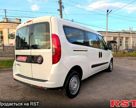 Белый Фиат Добло, объемом двигателя 1.3 л и пробегом 100 тыс. км за 10800 $, фото 2 на Automoto.ua