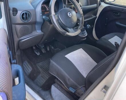 Белый Фиат Добло, объемом двигателя 1.9 л и пробегом 235 тыс. км за 2600 $, фото 4 на Automoto.ua