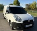 Белый Фиат Добло, объемом двигателя 1.2 л и пробегом 309 тыс. км за 5000 $, фото 1 на Automoto.ua