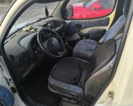 Белый Фиат Добло, объемом двигателя 1.91 л и пробегом 327 тыс. км за 1800 $, фото 4 на Automoto.ua