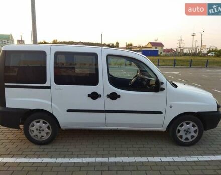 Белый Фиат Добло, объемом двигателя 1.2 л и пробегом 256 тыс. км за 3300 $, фото 1 на Automoto.ua
