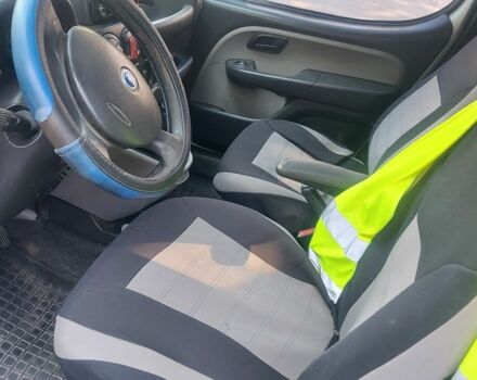 Белый Фиат Добло, объемом двигателя 1.2 л и пробегом 320 тыс. км за 3750 $, фото 2 на Automoto.ua