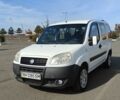 Белый Фиат Добло, объемом двигателя 1.2 л и пробегом 265 тыс. км за 4500 $, фото 1 на Automoto.ua