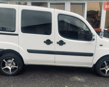 Белый Фиат Добло, объемом двигателя 1.25 л и пробегом 325 тыс. км за 5500 $, фото 4 на Automoto.ua