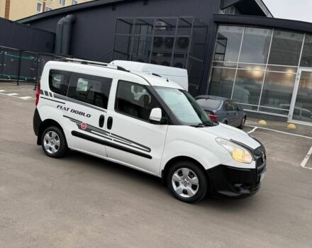 Белый Фиат Добло, объемом двигателя 1.2 л и пробегом 220 тыс. км за 5999 $, фото 2 на Automoto.ua