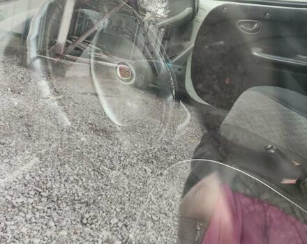 Белый Фиат Добло, объемом двигателя 1.3 л и пробегом 300 тыс. км за 2990 $, фото 4 на Automoto.ua