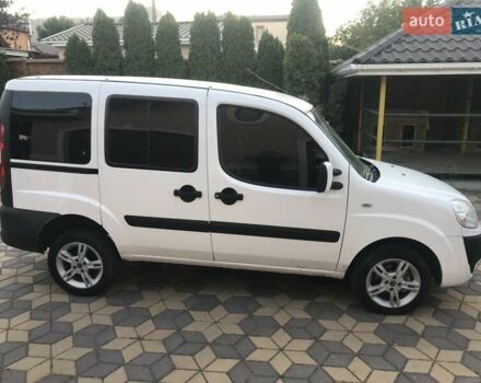 Белый Фиат Добло, объемом двигателя 1.25 л и пробегом 247 тыс. км за 6100 $, фото 1 на Automoto.ua