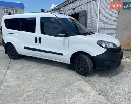 Белый Фиат Добло, объемом двигателя 1.37 л и пробегом 85 тыс. км за 13000 $, фото 15 на Automoto.ua