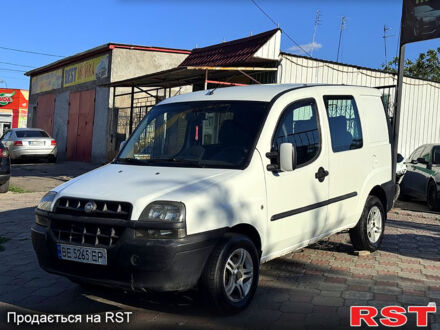 Белый Фиат Добло, объемом двигателя 1.9 л и пробегом 300 тыс. км за 2999 $, фото 1 на Automoto.ua