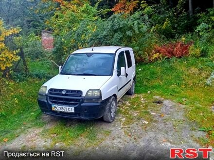 Белый Фиат Добло, объемом двигателя 1.6 л и пробегом 302 тыс. км за 3650 $, фото 1 на Automoto.ua
