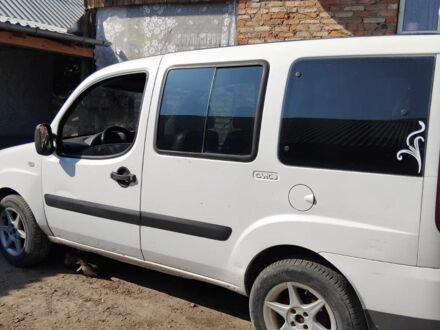 Белый Фиат Добло, объемом двигателя 1.4 л и пробегом 200 тыс. км за 3200 $, фото 1 на Automoto.ua