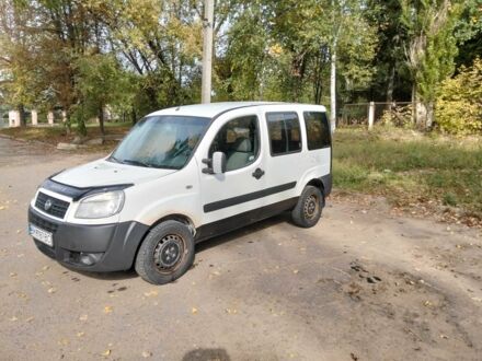 Белый Фиат Добло, объемом двигателя 1.2 л и пробегом 269 тыс. км за 3000 $, фото 1 на Automoto.ua