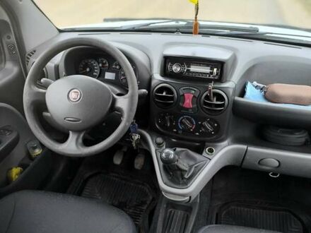 Белый Фиат Добло, объемом двигателя 1.2 л и пробегом 260 тыс. км за 4200 $, фото 1 на Automoto.ua