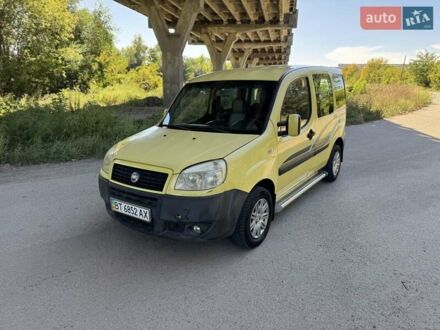Белый Фиат Добло, объемом двигателя 1.25 л и пробегом 240 тыс. км за 3999 $, фото 1 на Automoto.ua