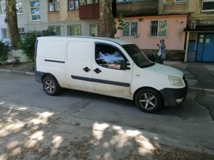 Белый Фиат Добло, объемом двигателя 1.4 л и пробегом 198 тыс. км за 7000 $, фото 1 на Automoto.ua