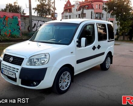 Белый Фиат Добло, объемом двигателя 1.4 л и пробегом 210 тыс. км за 5100 $, фото 1 на Automoto.ua