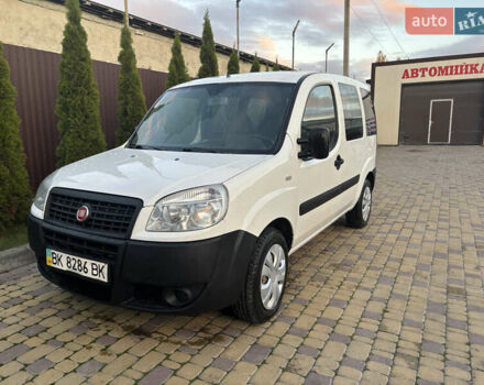 Белый Фиат Добло, объемом двигателя 1.25 л и пробегом 325 тыс. км за 3350 $, фото 1 на Automoto.ua