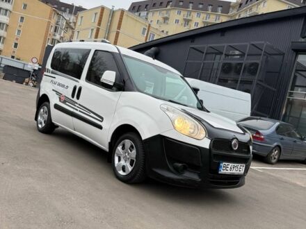 Белый Фиат Добло, объемом двигателя 1.2 л и пробегом 220 тыс. км за 5999 $, фото 1 на Automoto.ua