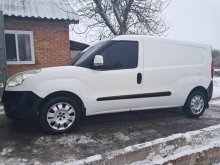 Белый Фиат Добло, объемом двигателя 1.2 л и пробегом 285 тыс. км за 4300 $, фото 1 на Automoto.ua