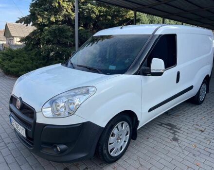 Белый Фиат Добло, объемом двигателя 1.6 л и пробегом 230 тыс. км за 7500 $, фото 1 на Automoto.ua