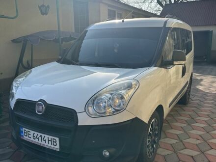 Белый Фиат Добло, объемом двигателя 1.2 л и пробегом 169 тыс. км за 8500 $, фото 1 на Automoto.ua