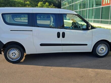 Белый Фиат Добло, объемом двигателя 1.3 л и пробегом 94 тыс. км за 10500 $, фото 1 на Automoto.ua