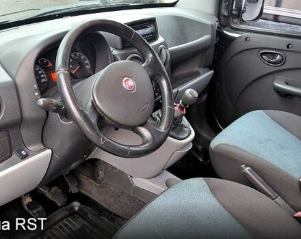 Черный Фиат Добло, объемом двигателя 1.4 л и пробегом 265 тыс. км за 3500 $, фото 7 на Automoto.ua