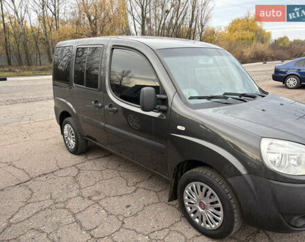 Черный Фиат Добло, объемом двигателя 1.37 л и пробегом 210 тыс. км за 5200 $, фото 1 на Automoto.ua