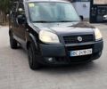 Черный Фиат Добло, объемом двигателя 1.4 л и пробегом 153 тыс. км за 7500 $, фото 1 на Automoto.ua