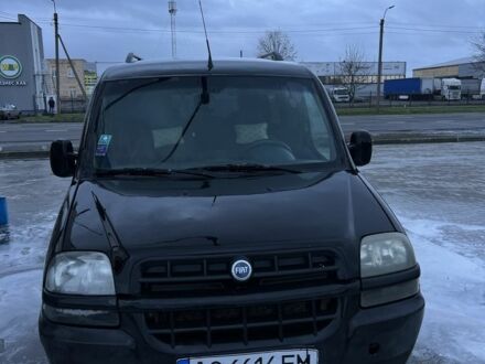 Черный Фиат Добло, объемом двигателя 1.3 л и пробегом 345 тыс. км за 2800 $, фото 1 на Automoto.ua