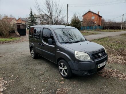 Черный Фиат Добло, объемом двигателя 1.4 л и пробегом 211 тыс. км за 4200 $, фото 1 на Automoto.ua