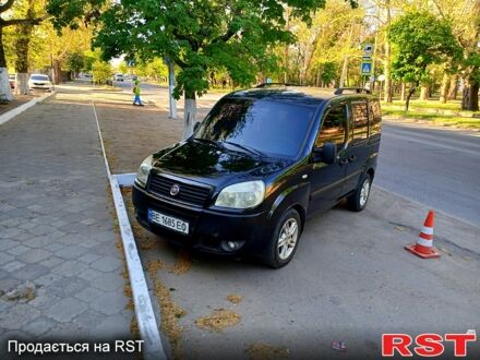 Черный Фиат Добло, объемом двигателя 1.4 л и пробегом 400 тыс. км за 4900 $, фото 1 на Automoto.ua