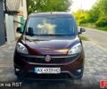 Красный Фиат Добло, объемом двигателя 1.4 л и пробегом 75 тыс. км за 11900 $, фото 1 на Automoto.ua