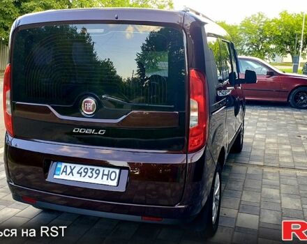 Красный Фиат Добло, объемом двигателя 1.4 л и пробегом 75 тыс. км за 11900 $, фото 2 на Automoto.ua