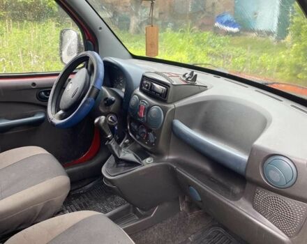 Красный Фиат Добло, объемом двигателя 1.2 л и пробегом 325 тыс. км за 2500 $, фото 5 на Automoto.ua