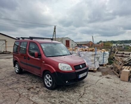 Красный Фиат Добло, объемом двигателя 1.2 л и пробегом 354 тыс. км за 3500 $, фото 1 на Automoto.ua