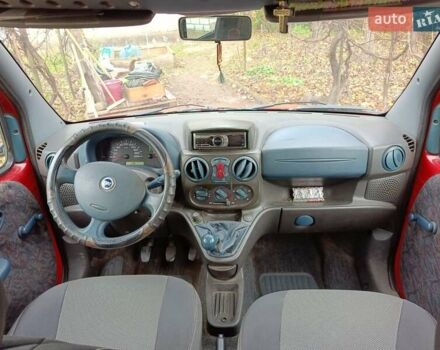 Красный Фиат Добло, объемом двигателя 1.91 л и пробегом 330 тыс. км за 3800 $, фото 8 на Automoto.ua