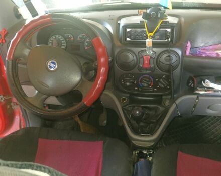 Красный Фиат Добло, объемом двигателя 1.2 л и пробегом 250 тыс. км за 2600 $, фото 2 на Automoto.ua