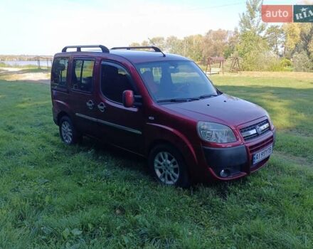 Красный Фиат Добло, объемом двигателя 1.37 л и пробегом 139 тыс. км за 5500 $, фото 1 на Automoto.ua