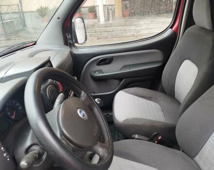 Красный Фиат Добло, объемом двигателя 1.3 л и пробегом 299 тыс. км за 6000 $, фото 12 на Automoto.ua