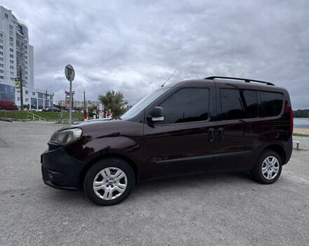 Красный Фиат Добло, объемом двигателя 1.25 л и пробегом 260 тыс. км за 8700 $, фото 1 на Automoto.ua