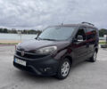 Красный Фиат Добло, объемом двигателя 1.25 л и пробегом 260 тыс. км за 8700 $, фото 1 на Automoto.ua