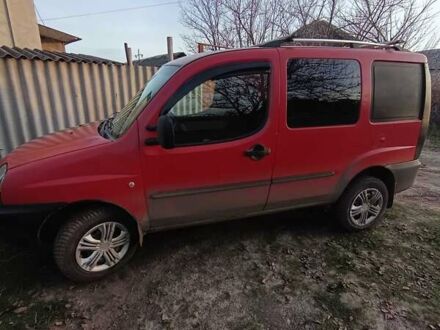 Красный Фиат Добло, объемом двигателя 1.9 л и пробегом 300 тыс. км за 3328 $, фото 1 на Automoto.ua