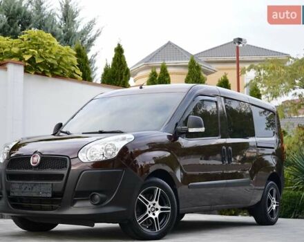 Красный Фиат Добло, объемом двигателя 1.6 л и пробегом 115 тыс. км за 8999 $, фото 1 на Automoto.ua