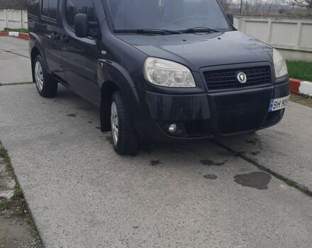 Серый Фиат Добло, объемом двигателя 1.4 л и пробегом 250 тыс. км за 3000 $, фото 1 на Automoto.ua