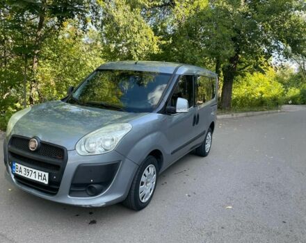 Серый Фиат Добло, объемом двигателя 1.2 л и пробегом 220 тыс. км за 7000 $, фото 1 на Automoto.ua